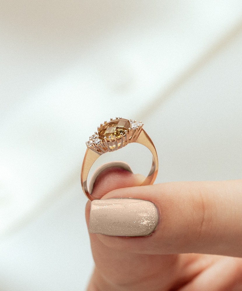 Gold ring with sultanite and zircons