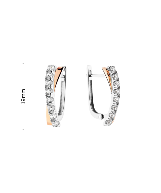 Hopeiset korvakorut peittää kullalla zirkoneilla