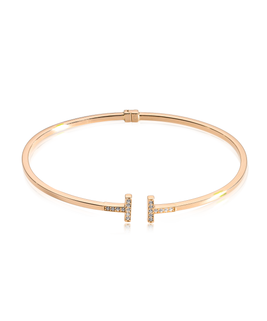 Gold hard bracelet with zircons