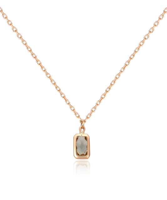 Kultainen kaulakoru zirkoniriipuksella