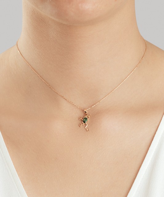 Gold pendant with zirconium "frog"