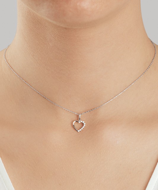 White gold pendant with zircons "heart"
