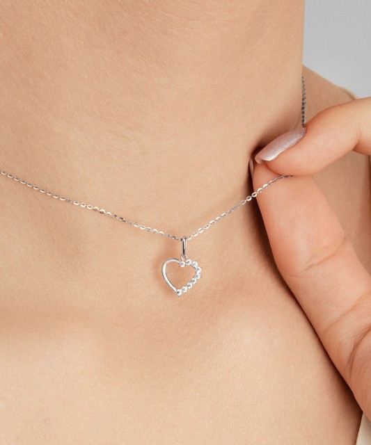 White gold pendant with zircons "heart"