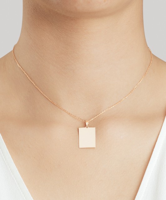 Kultainen riipus "Lautanen"