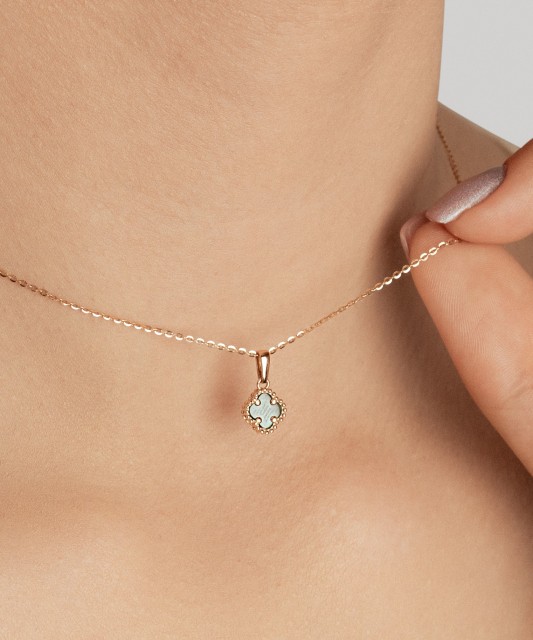 Golden pendant with malachite