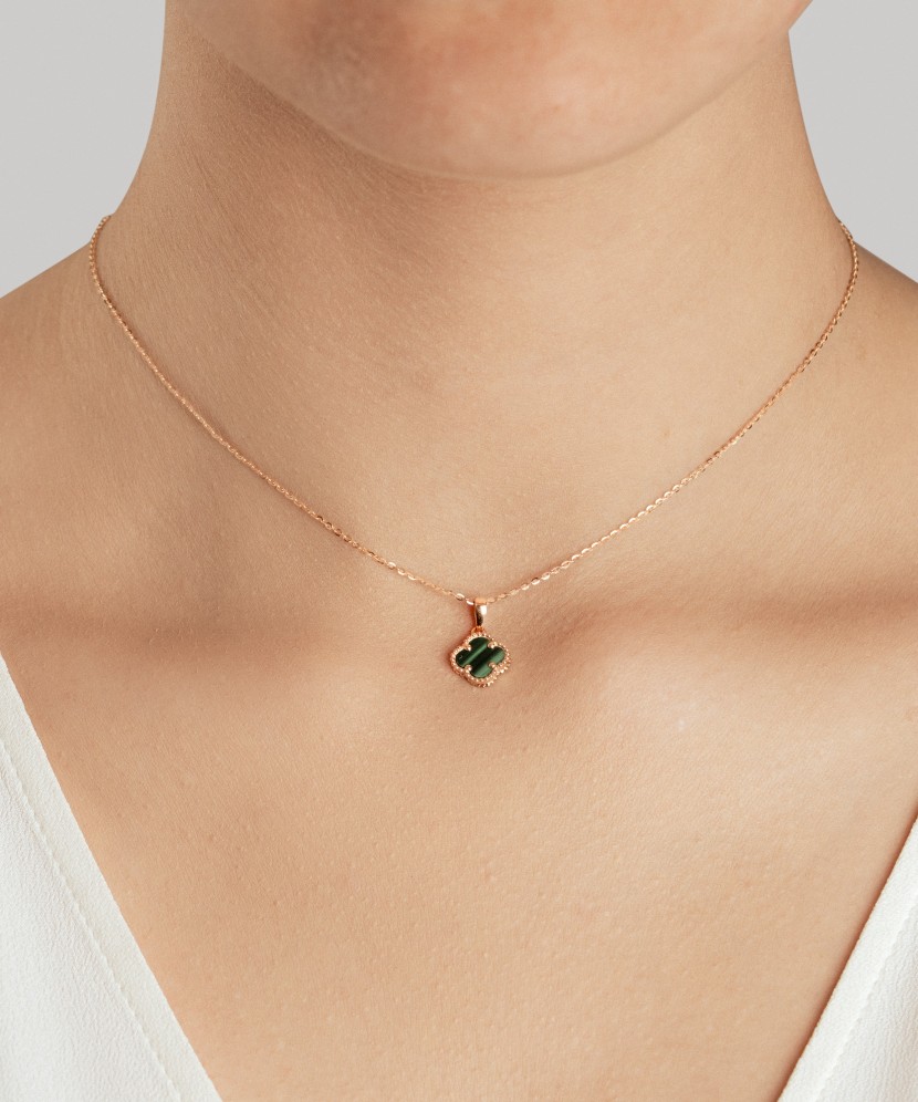 Golden pendant with malachite