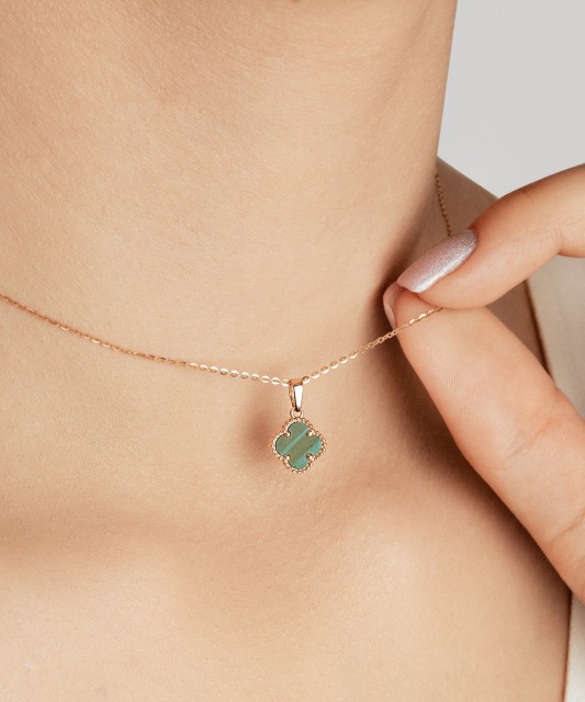 Golden pendant with malachite