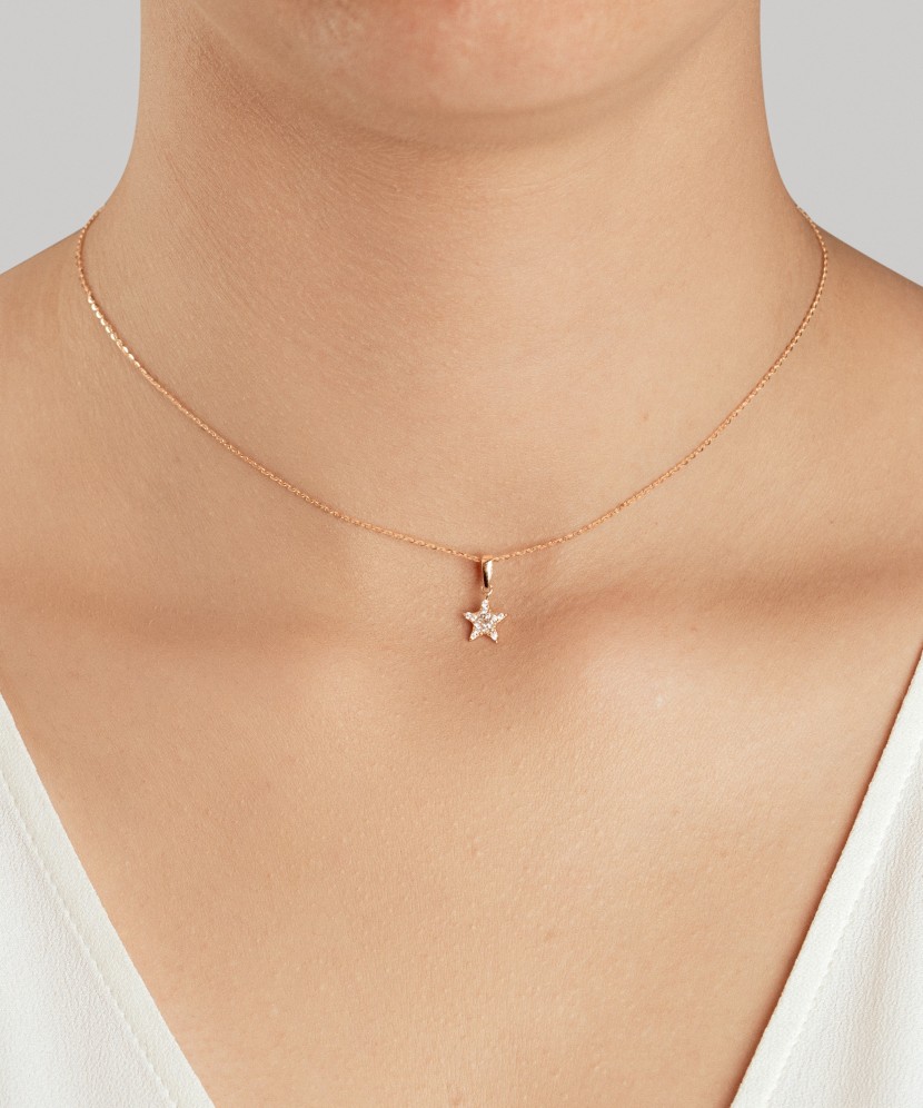 Kultainen riipus zirkoneilla "tähti"