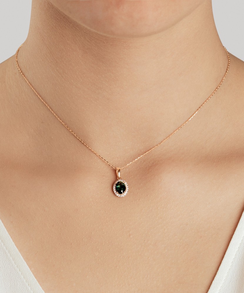 Gold pendant with zircons