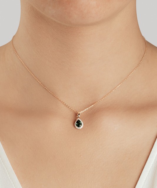 Gold pendant with zircons