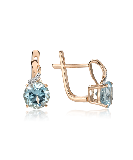 Gold earrings with diamonds and topazes