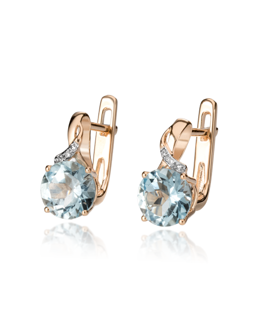 Gold earrings with diamonds and topazes