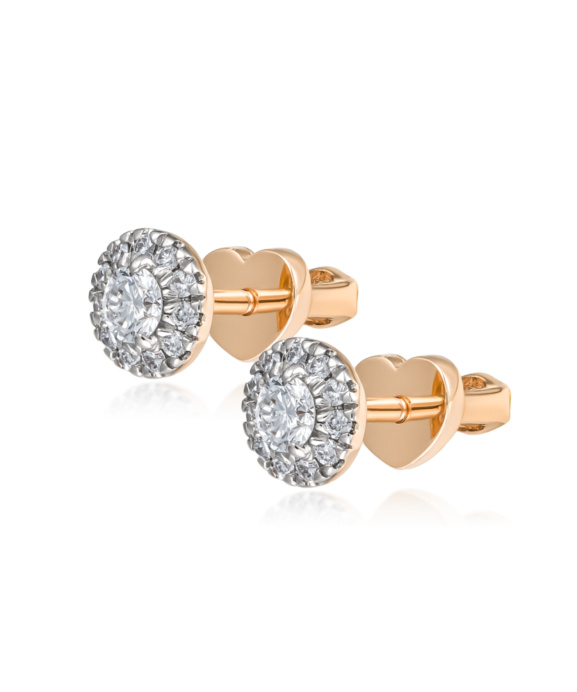 Kultaiset korvakorut timanteilla