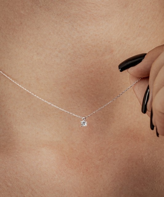 White gold chain with zirconium pendant