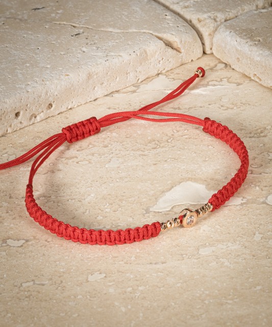 Red Thread Bracelet with a Golden Zirconia Pendant