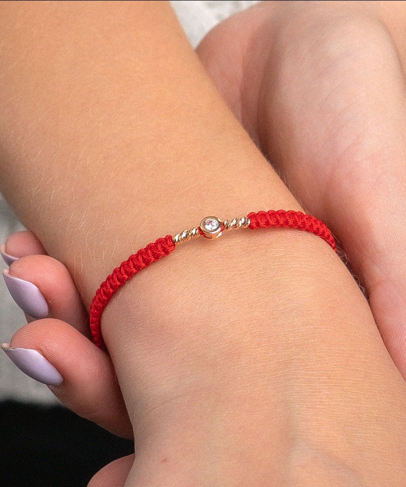 Red Thread Bracelet with a Golden Zirconia Pendant