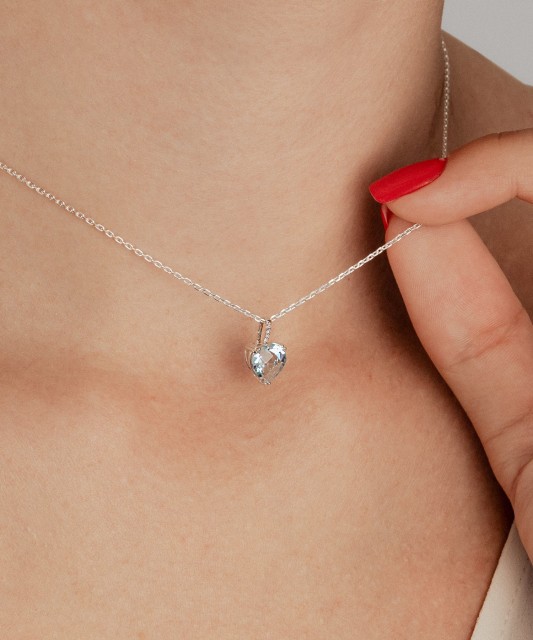 White gold pendant with topaz and diamonds "Heart"