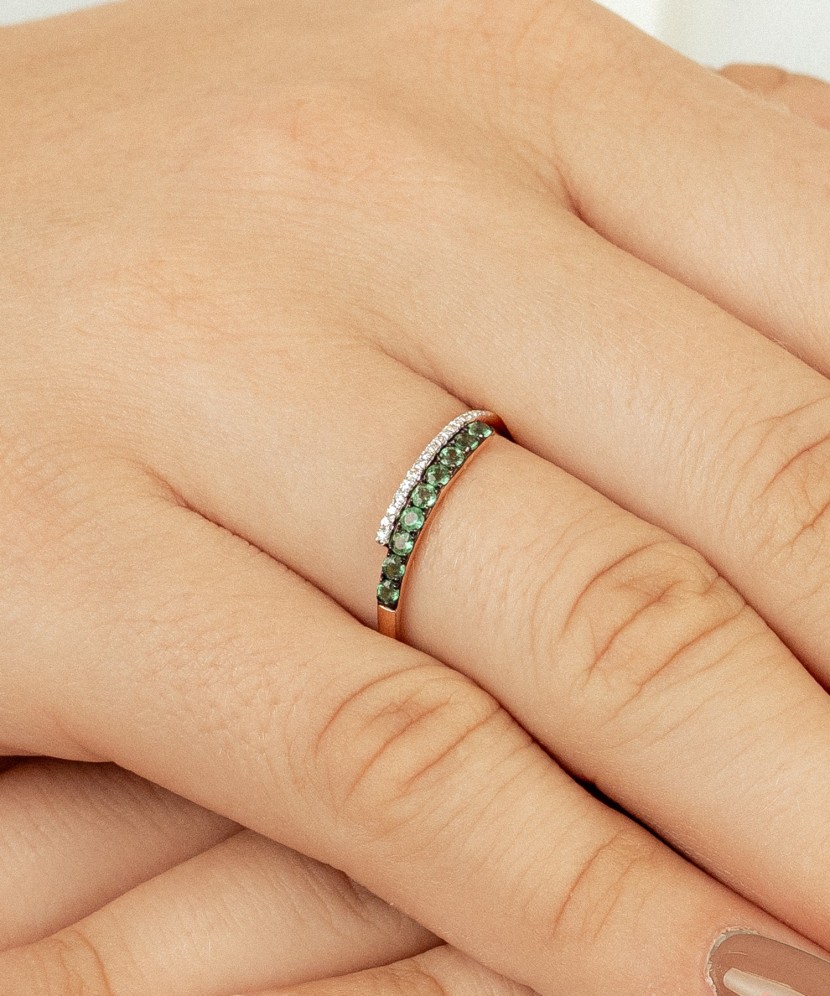 Gold ring with emeralds and diamonds