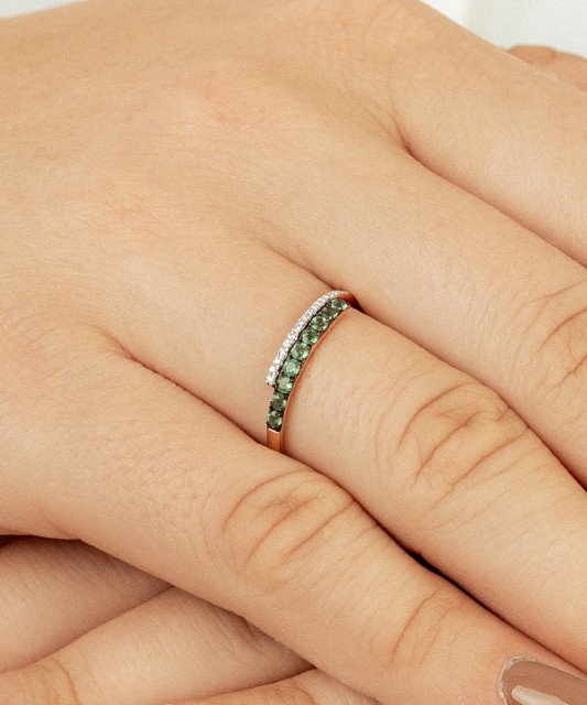 Gold ring with emeralds and diamonds