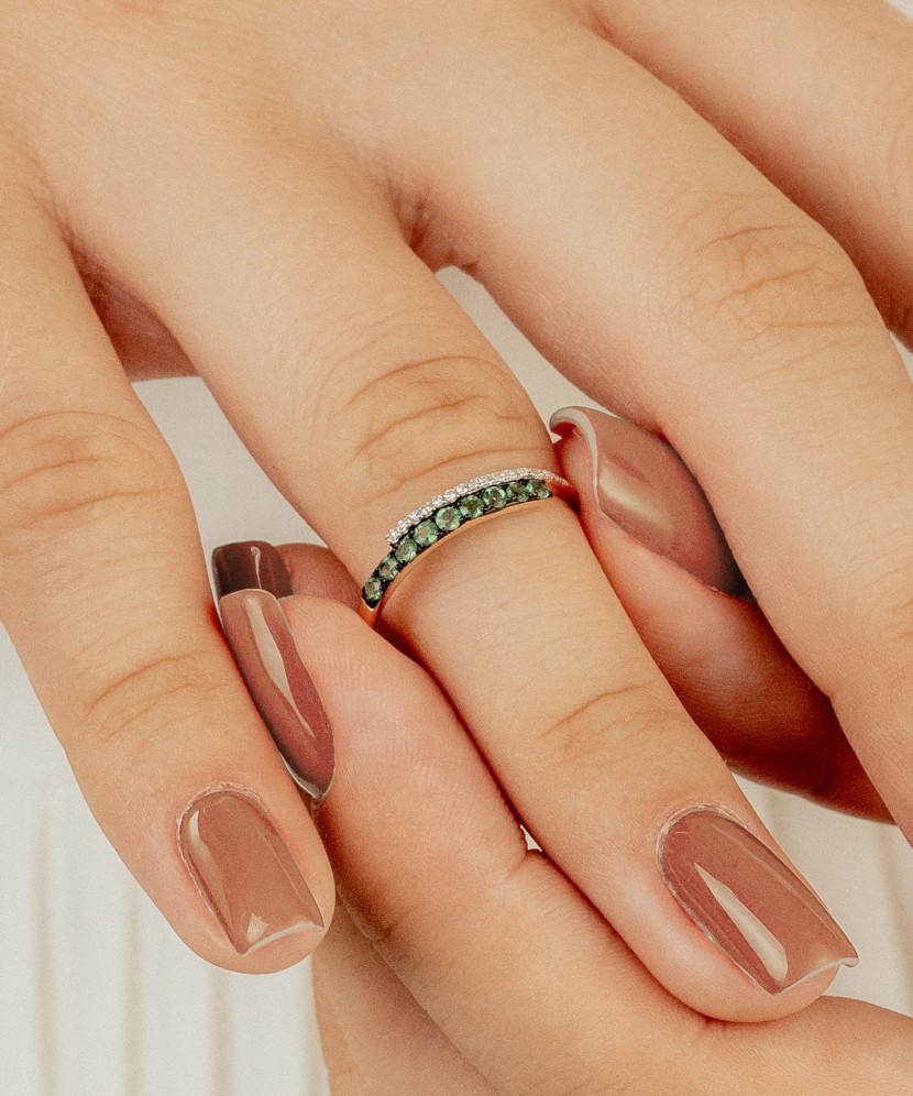 Gold ring with emeralds and diamonds