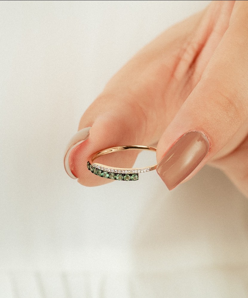 Gold ring with emeralds and diamonds