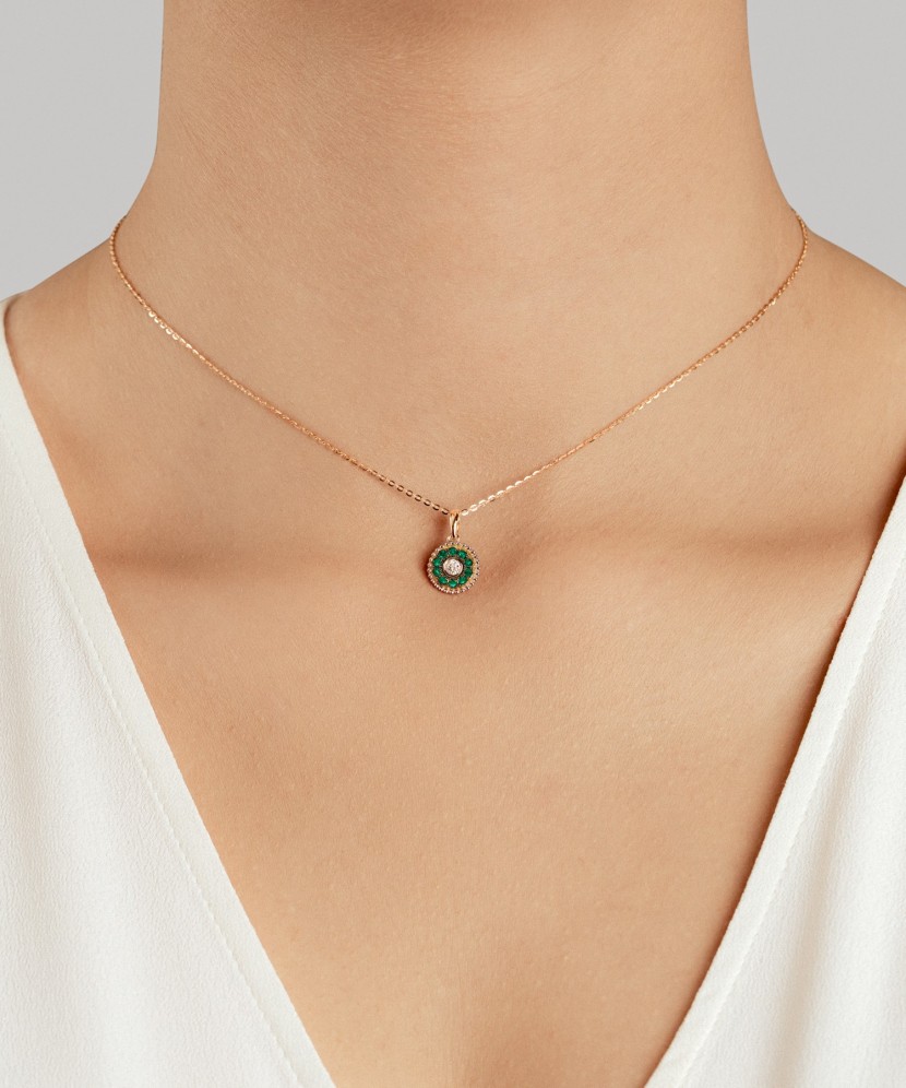 Yellow gold pendant with emeralds and diamonds