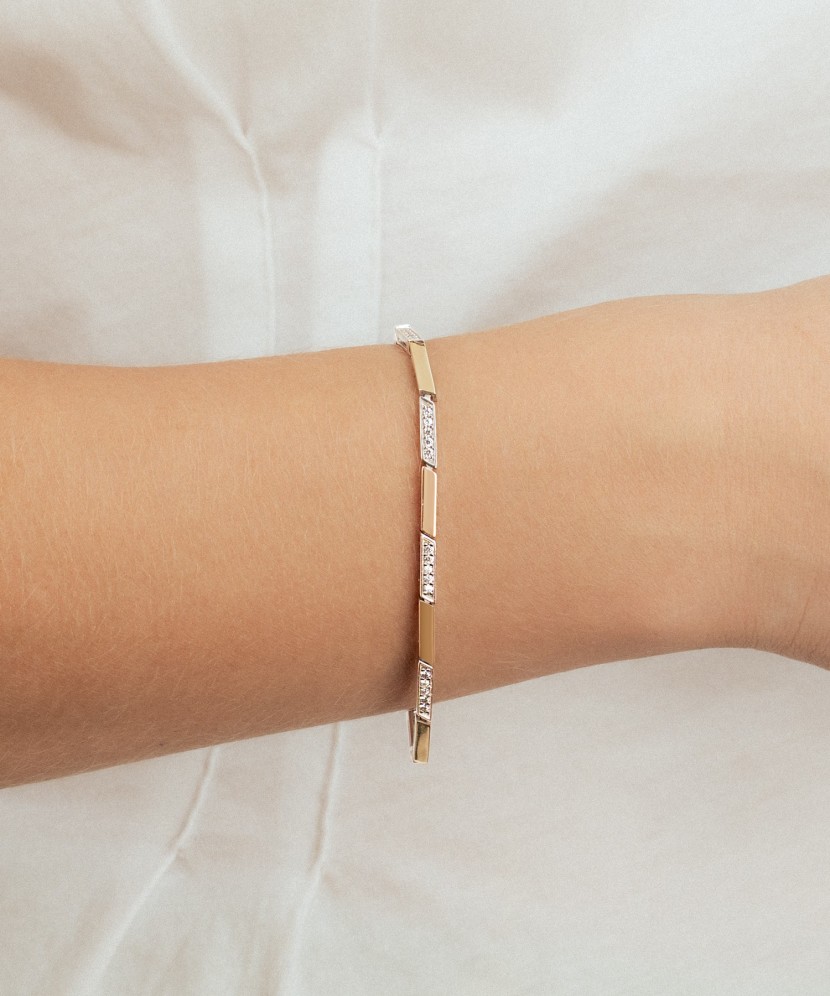 Hopeinen rannekoru zirkoneilla kullalla peitetty