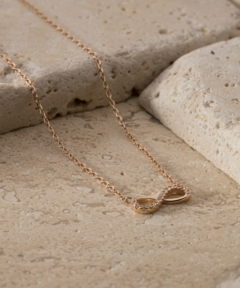 Gold chain with zirconium pendant "infinity"