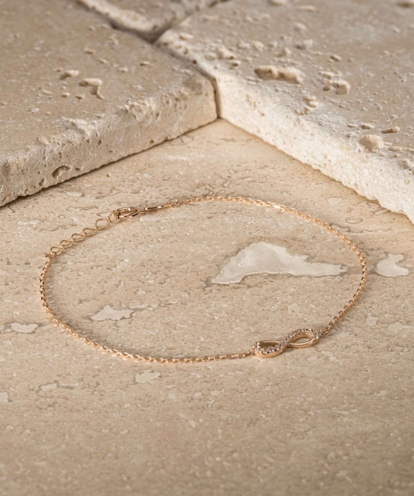 Valkokultainen rannekoru zirkoneilla "Infinity"