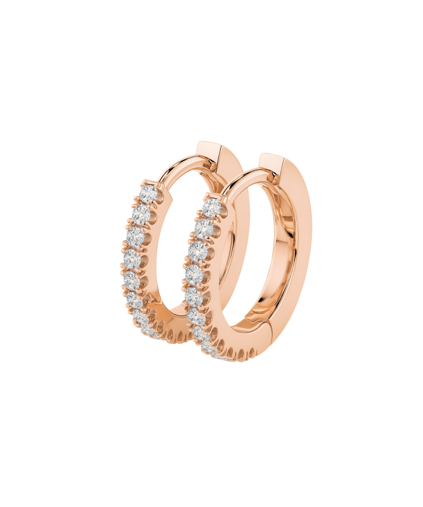 Kultaiset korvakorut timanteilla