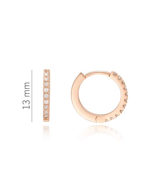 Kultaiset korvakorut timanteilla