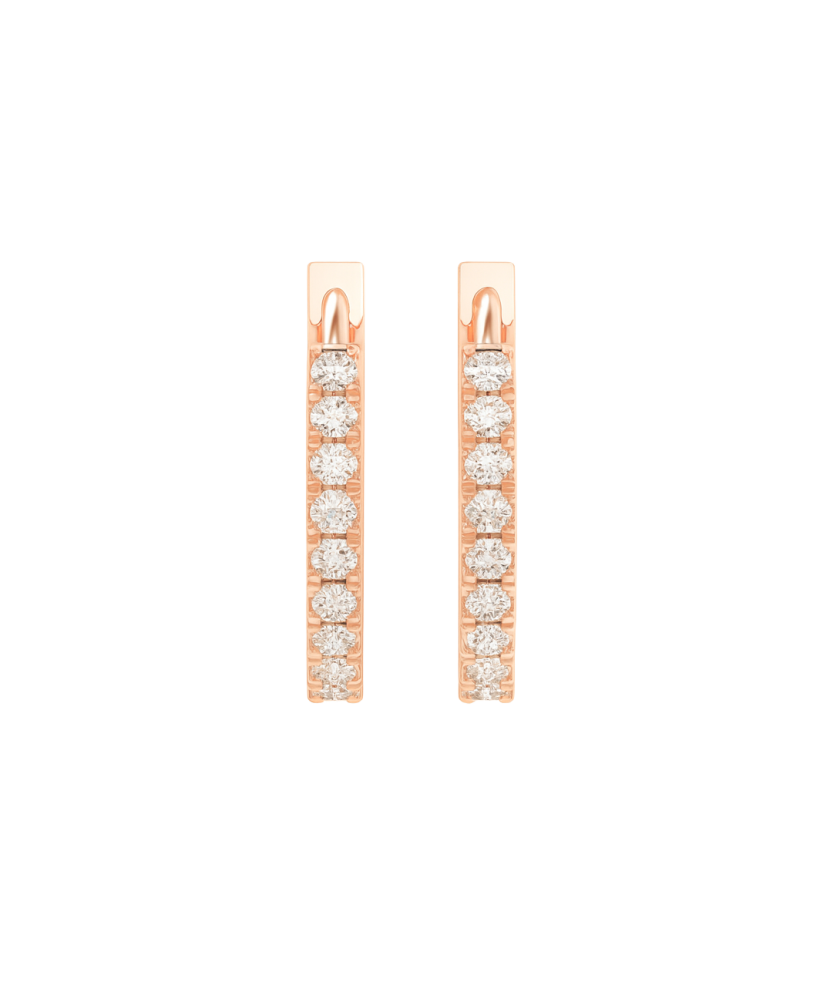Kultaiset korvakorut timanteilla