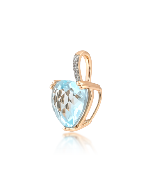 Kultainen riipus topaasilla ja zirkoneilla