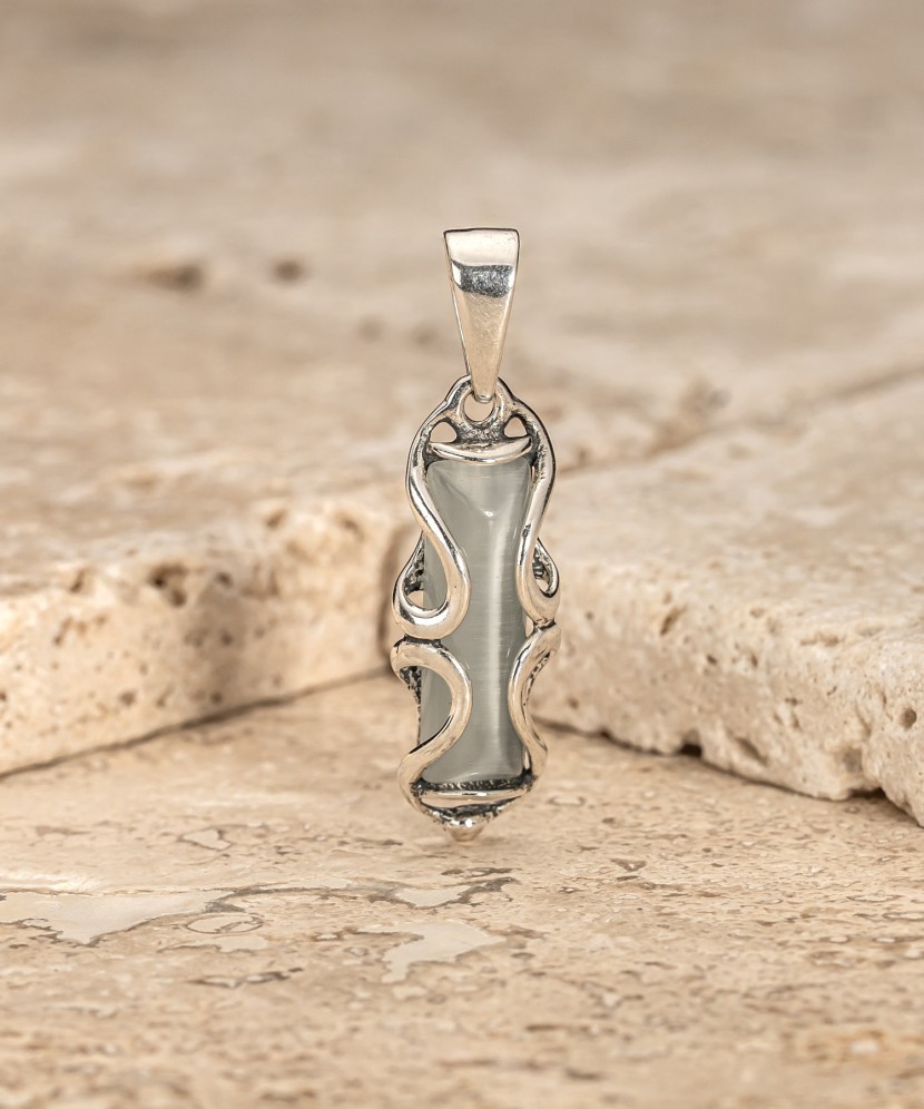 Sterling silver pendant with cats eye stone
