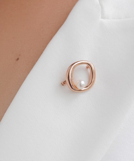 Gilded sterling silver brooch with pearl