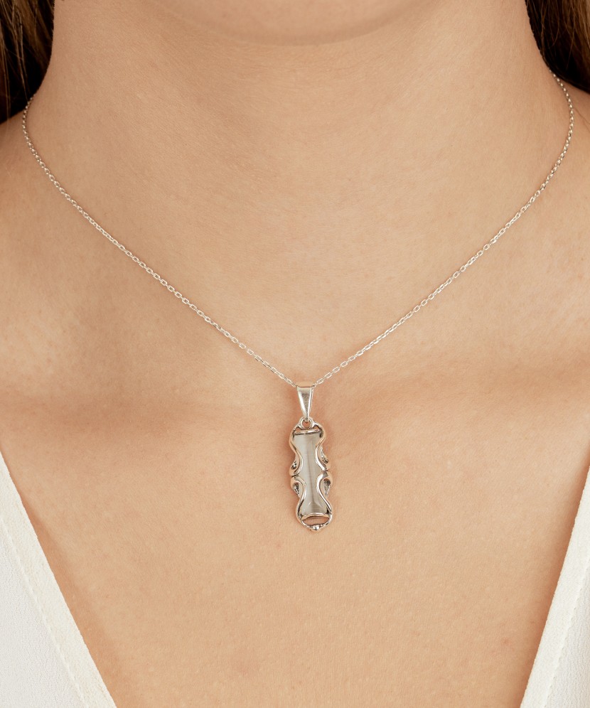 Sterling silver pendant with cats eye stone