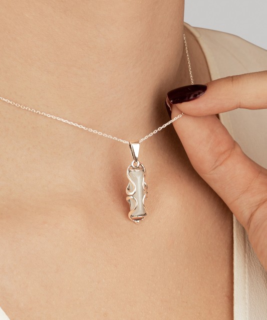 Sterling silver pendant with cats eye stone