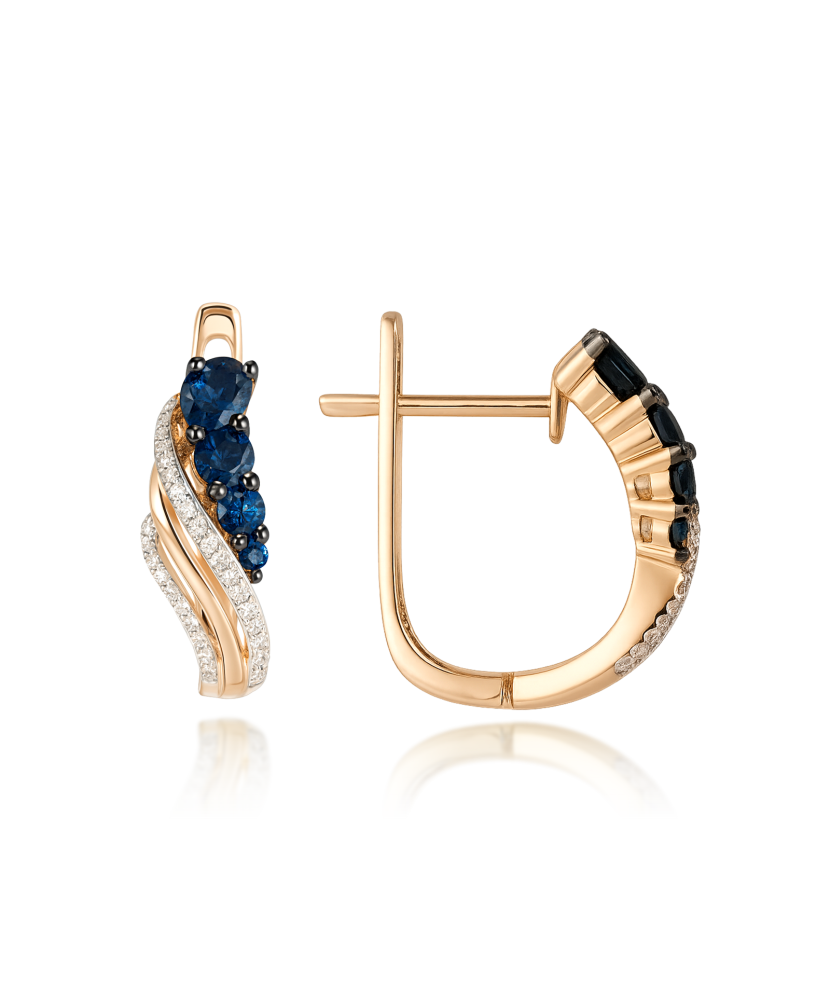 Kultaiset korvakorut timanteilla ja safiireilla