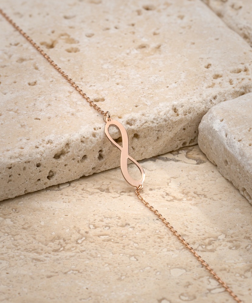 Kultainen rannekoru "ääretön"