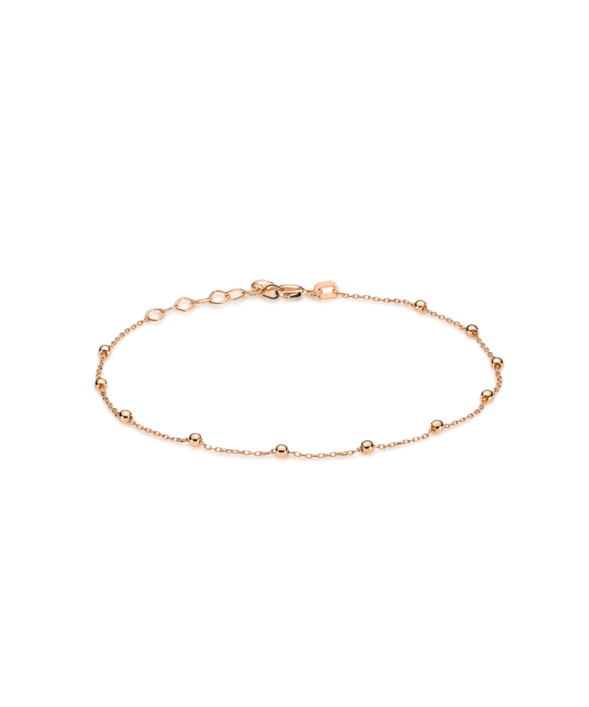 Kultainen jalkaranneke riipuksilla