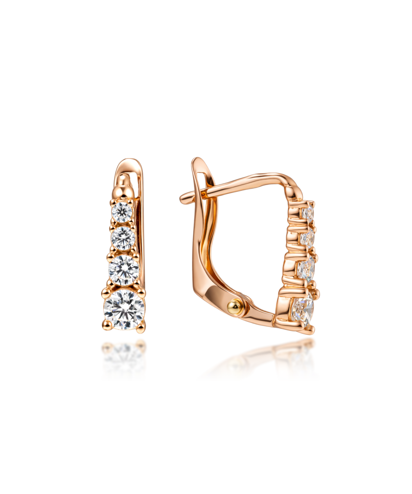 Kultaiset korvakorut zirkoneilla