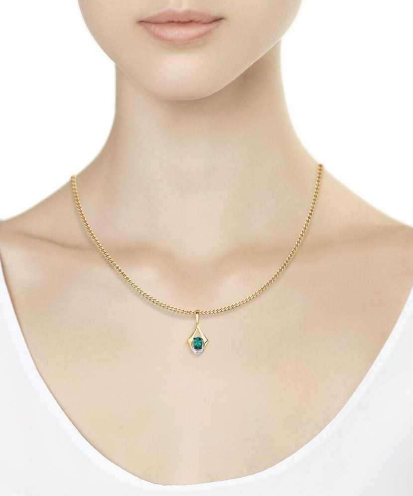 Gold pendant with diamond and emerald