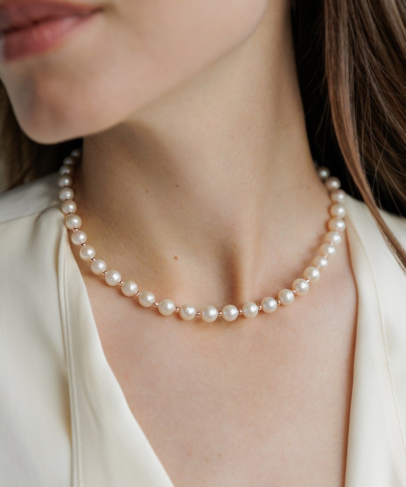 Pearl necklaces with gold
