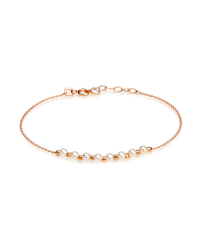 Gold bracelet with pearls
