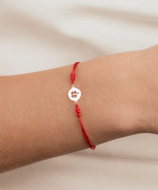 Red string bracelet with gold zirconia pendant