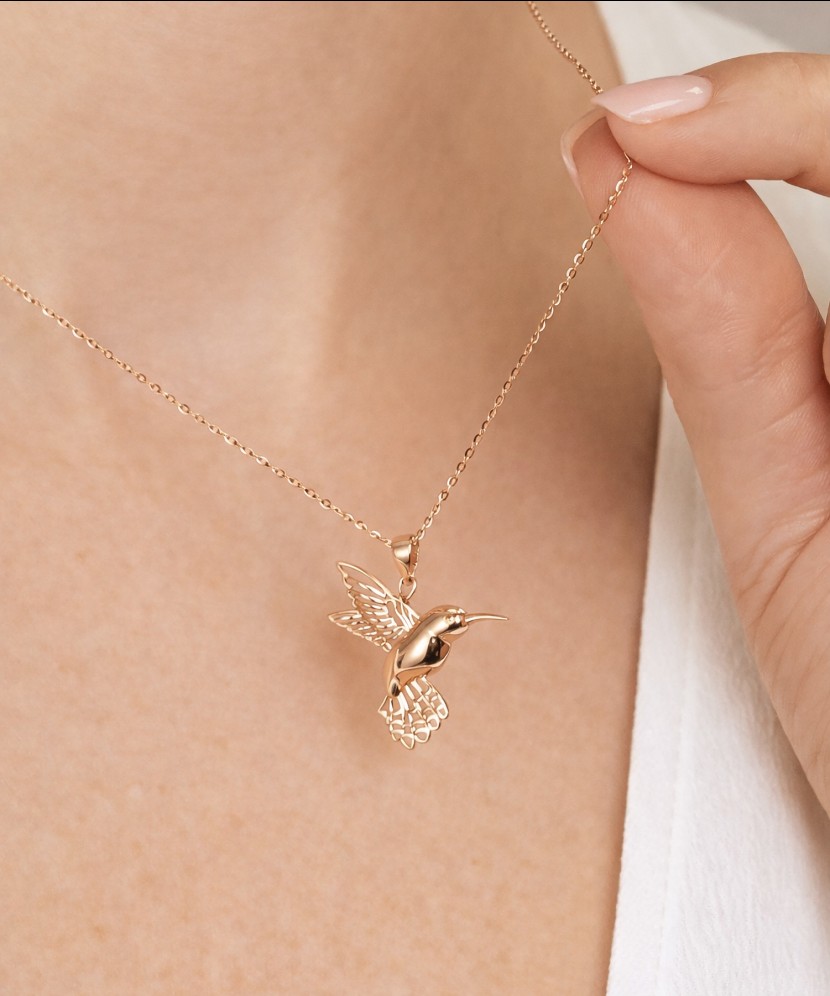 Kultainen riipus "kolibri"