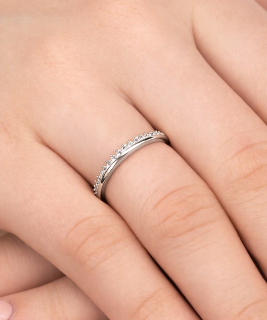 White gold ring with zircons