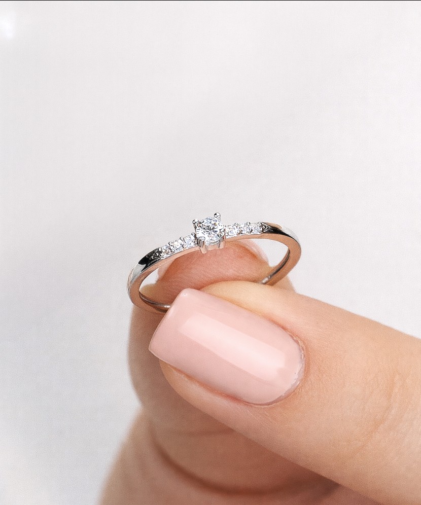 White gold ring with zircons