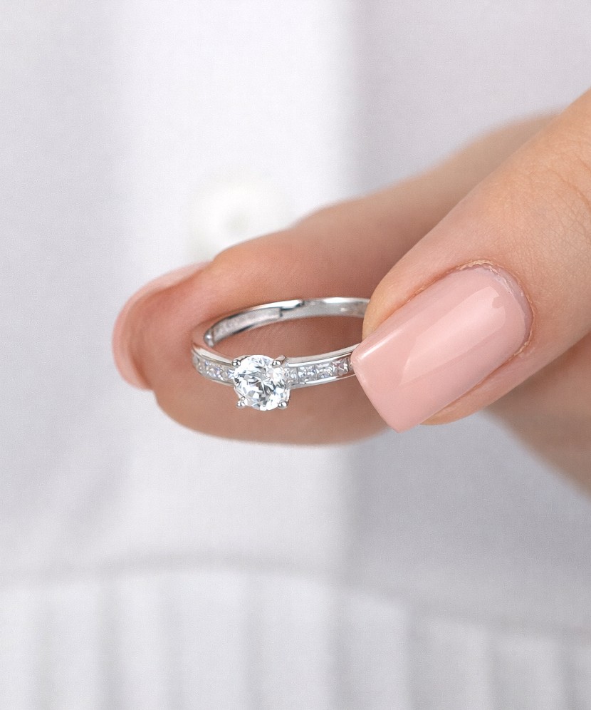 White gold ring with zircons