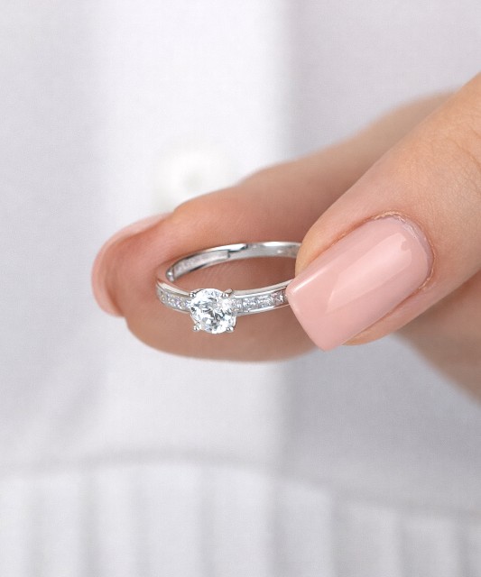 White gold ring with zircons